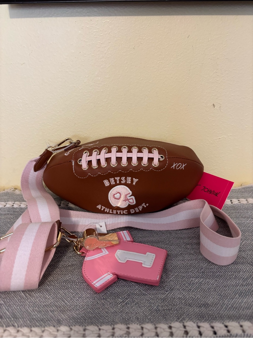 Betsey Johnson Brown & Pink Football Crossbody with Pink Striped Strap and Charm